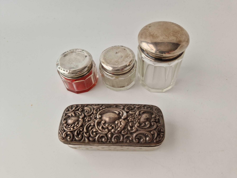 Four various silver top jars with glass bodies, 1 Birmingham 1903