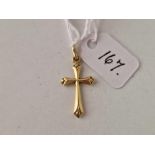 A cross pendant 14ct gold