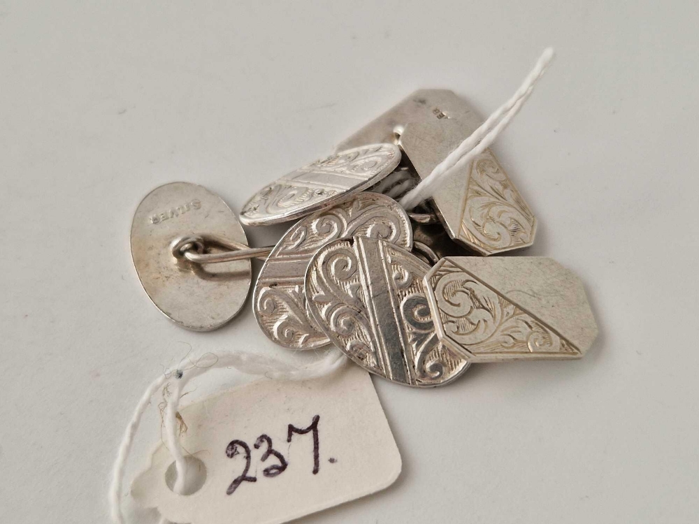 Two pairs of silver cufflinks