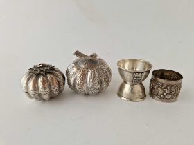 Two Eastern white metal pumpkin shaped jars and covers, a napkin ring and a French egg cup