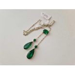 A Edwardian silver drop pendant necklace set with green paste