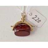 A carnelian swivel fob 9ct