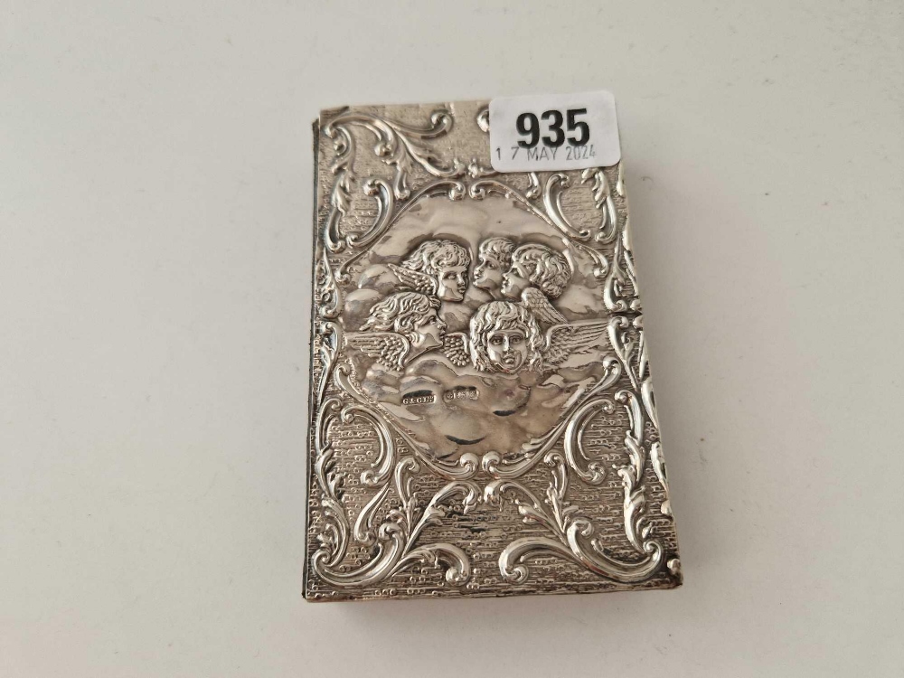 An Edwardian silver mounted prayer book, decorated with angels, 4.5 inches high, Birmingham 1903