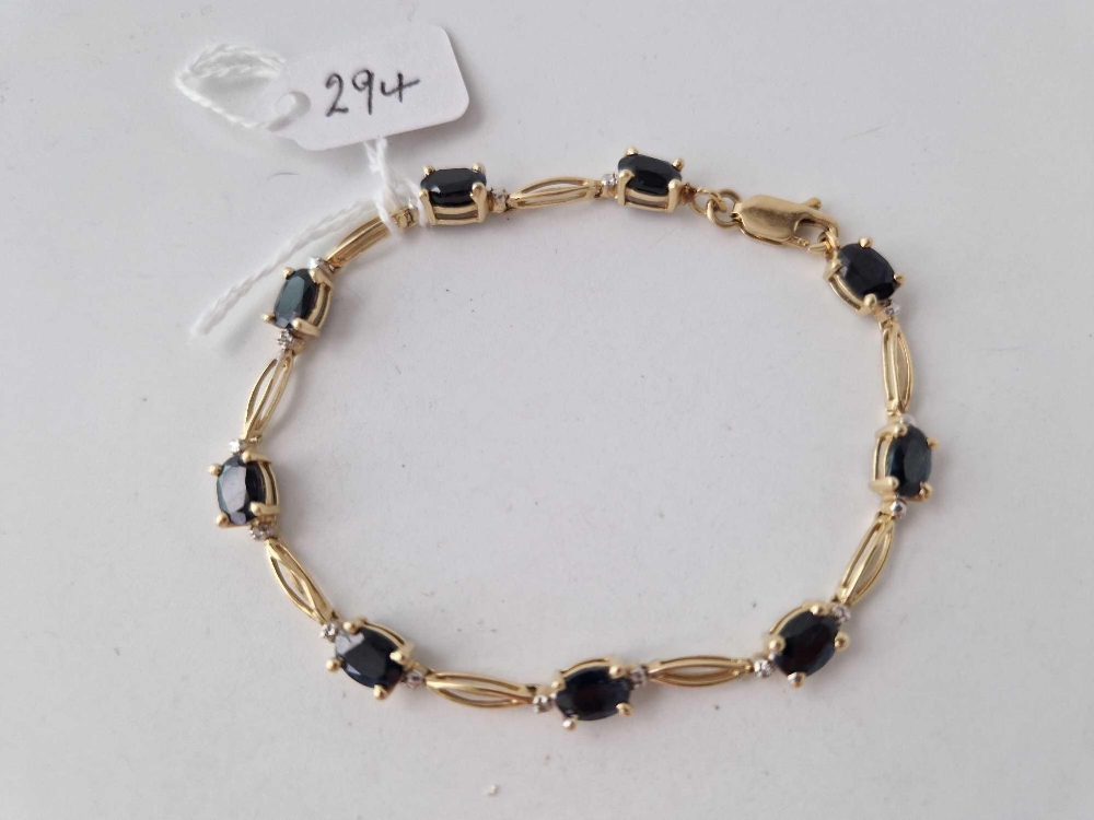 A SAPPHIRE AND DIAMOND BRACELET 7.5 INCH 14CT GOLD 9 GMS