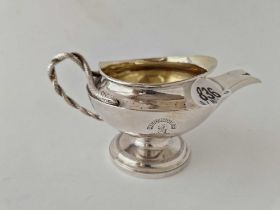George III cream jug also with snake handle gilt interior. 6 in wide. London 1902 By S H 220gm