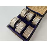 Boxed set of six scroll engraved napkin rings. Chester 1909. 55gms