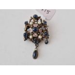 A Austro Hungarian silver enamel brooch set with sapphires and pearls