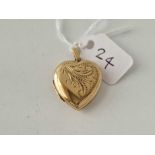 A heart shaped locket 9ct 4 gms