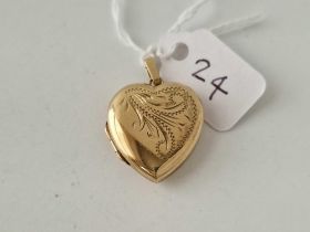 A heart shaped locket 9ct 4 gms