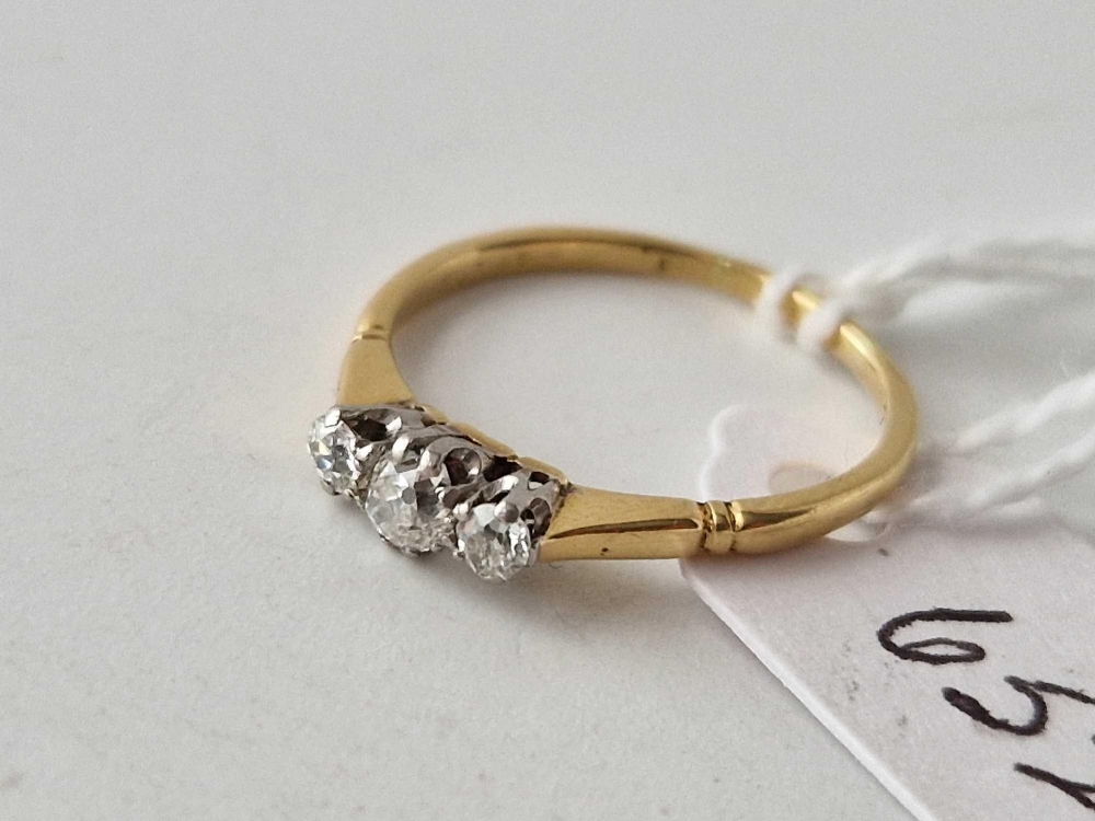 A three stone diamond ring 18ct gold size M 1.8 gms - Image 2 of 3