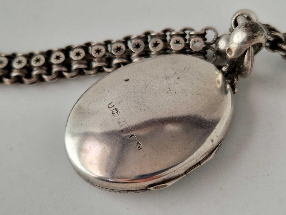 A Victorian engraved silver locket and chain Birmingham 1895 40 gms - Image 3 of 6