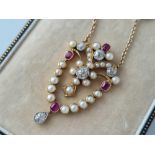 A GOOD QUALITY PEARL RUBY AND DIAMOND PENDANT NECKLACE SET IN GOLD 15 INCH 8.9 GMS BOXED