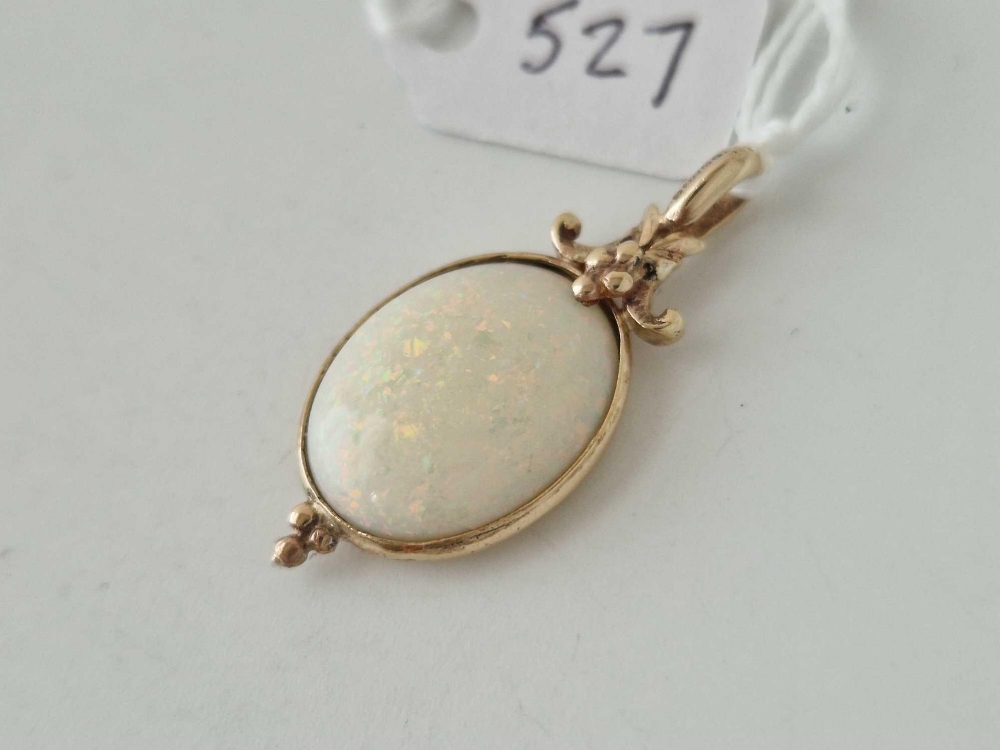 A opal mounted set pendant 9ct