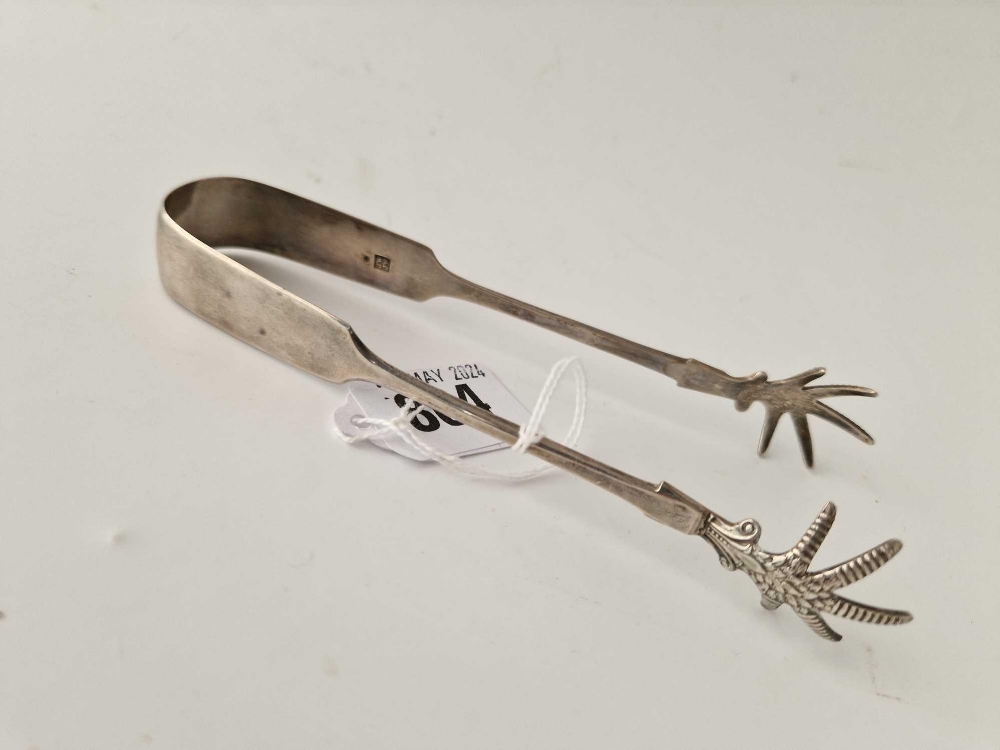 A pair of Exeter claw decorated sugar tongs, 1852 by JW,JW