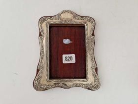 Art nouveau period photo frame with embossed border. 7.5 in high. Chester