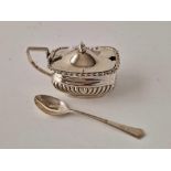 Oblong mustard pot half fluted and a tea spoon. Birmingham 1910. 60gm excl BGL chipped