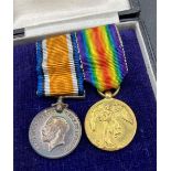 A pair of miniature medals in box from Baldwin & Son