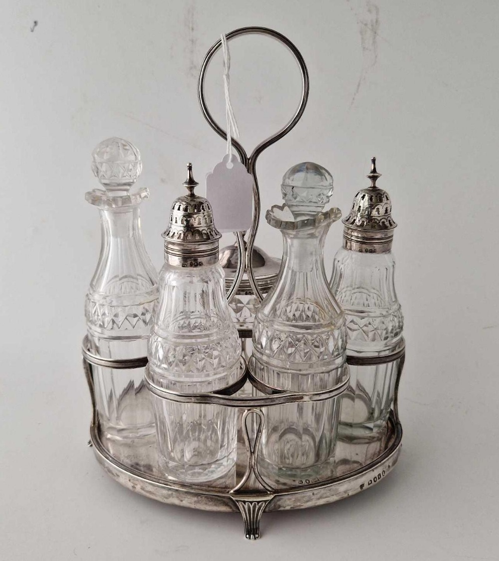 A good oval George III cruet set with five bottles and central ring handle, 9.5 inches high, - Image 2 of 2