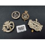 Group of four cap badges