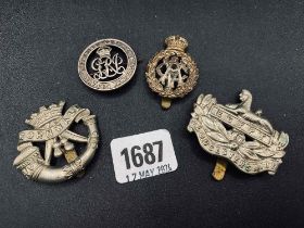 Group of four cap badges