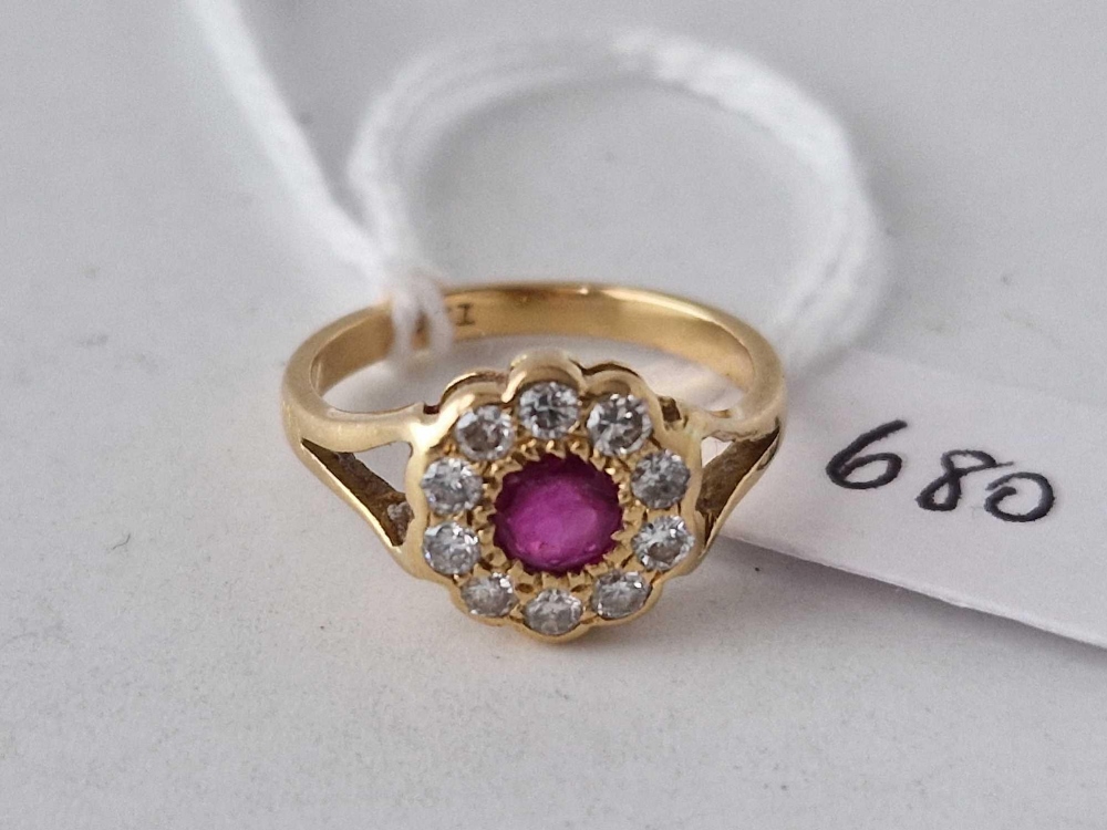 A ruby and diamond cluster ring 18ct gold size I