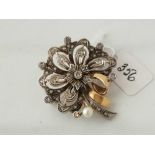 A Vintage continental gold and silver pearl and rose diamond brooch 11.7 gms