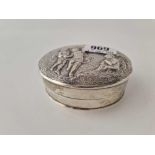An oval jar and cover, the top embossed with cherubs, 3.5" wide, London 1904 by PK & P, 92g