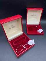 Two red OMEGA wrist watch boxes