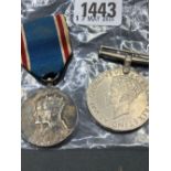 A George VI silver medal plus one other