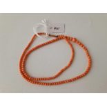 A small coral bead necklace 16 inch