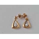 A pair of pearl set earrings 18ct gold 1.6 gms