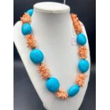 A Very Fine unusual oversized turquoise bead necklace with coral twig spacers 17 inch 130 gms