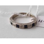 A sapphire and diamond half hoop ring 18ct gold size N 4 gms