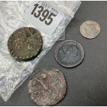 Four Roman coins