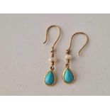 A pair turquoise and pearl earrings 14ct gold 1.4 gms