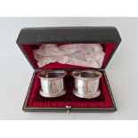 Pair of boxed plain napkin rings . Sheffield 1909 By W & H. 47gms