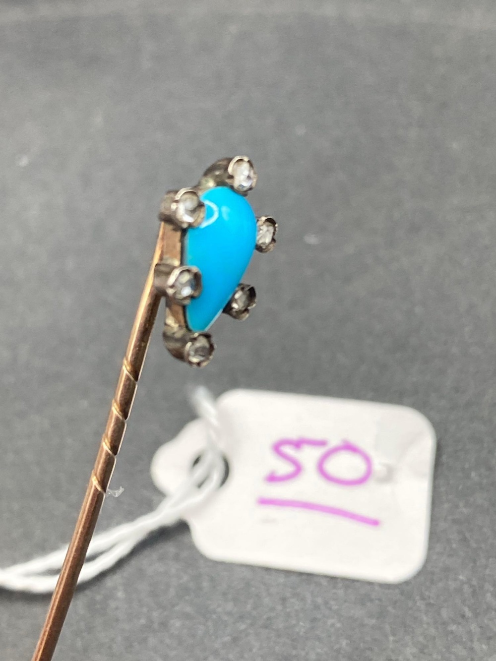 A very early Victorian turquoise and diamond stick pin
