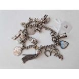 A silver charm bracelet 41.9 gms