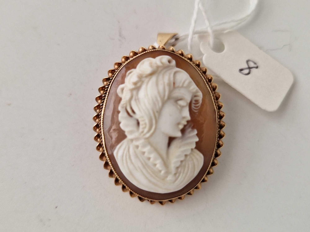 A gold shell cameo pendant brooch 9ct