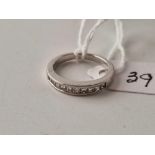 A PLATINUM AND DIAMOND HALF ETERNITY RING SIZE I 4.4 GMS BOXED
