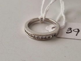 A PLATINUM AND DIAMOND HALF ETERNITY RING SIZE I 4.4 GMS BOXED