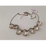 A silver stone set necklace 15 inch