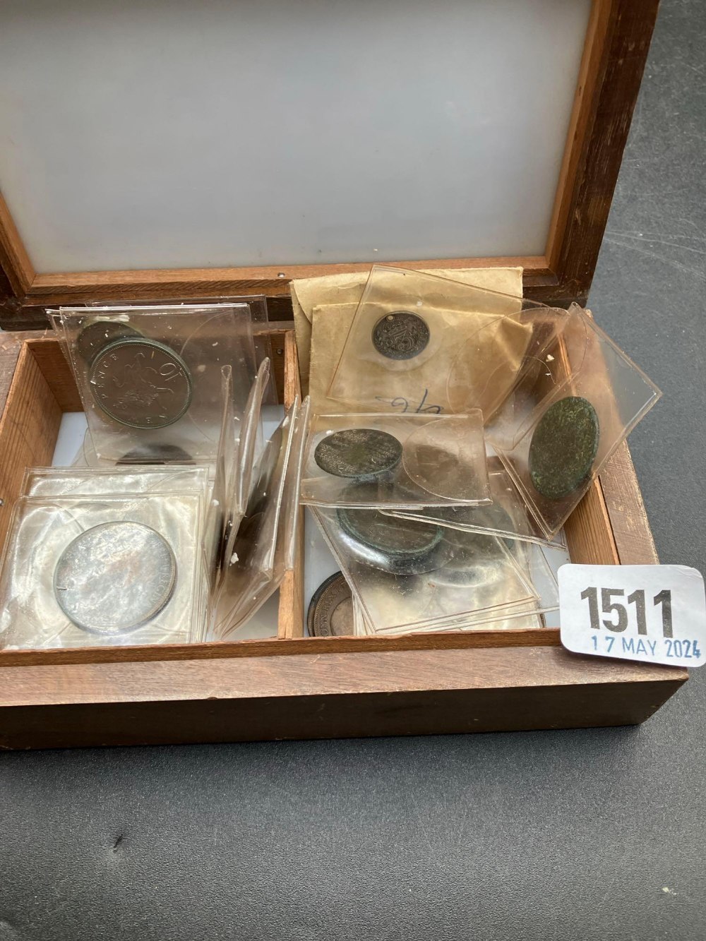 Box of coins in packets