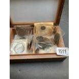 Box of coins in packets
