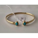 A TURQUOISE BANGLE 14CT GOLD 9.8 GMS