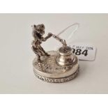 A miniature figure at an anvil, oval base, 1.5" wide, London 1898 with import mark