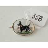 A vintage gold framed reverse intaglio Scottie brooch