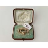 A Victorian crescent brooch with pearls 15ct gold 4.5 gms boxed