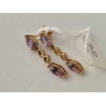 A pair of amethyst drop earrings 9ct 2.4 gms