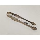 An attractive pair of Exeter bright cut sugar tongs by R Ferris, circa 1800